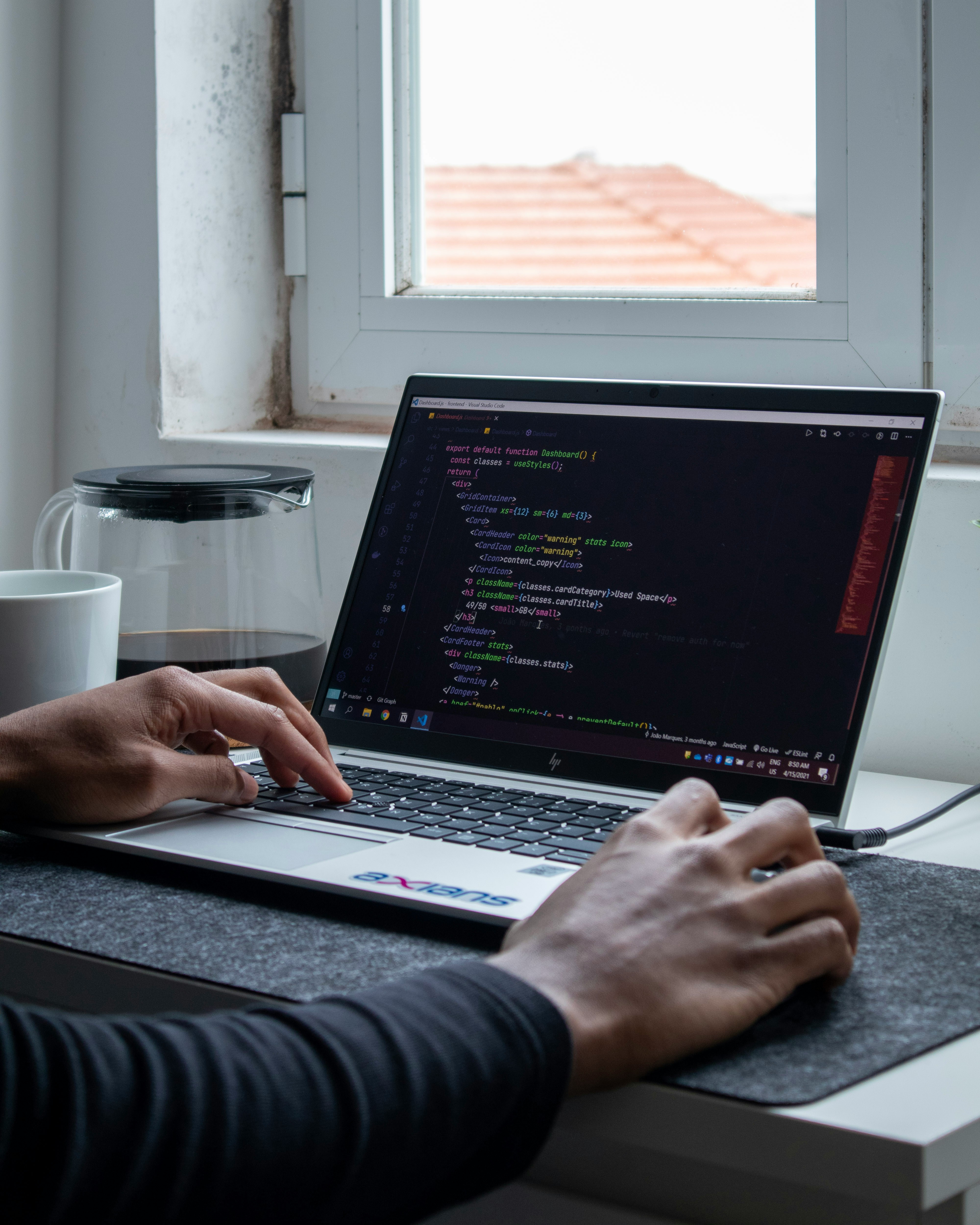 Professional developer at laptop